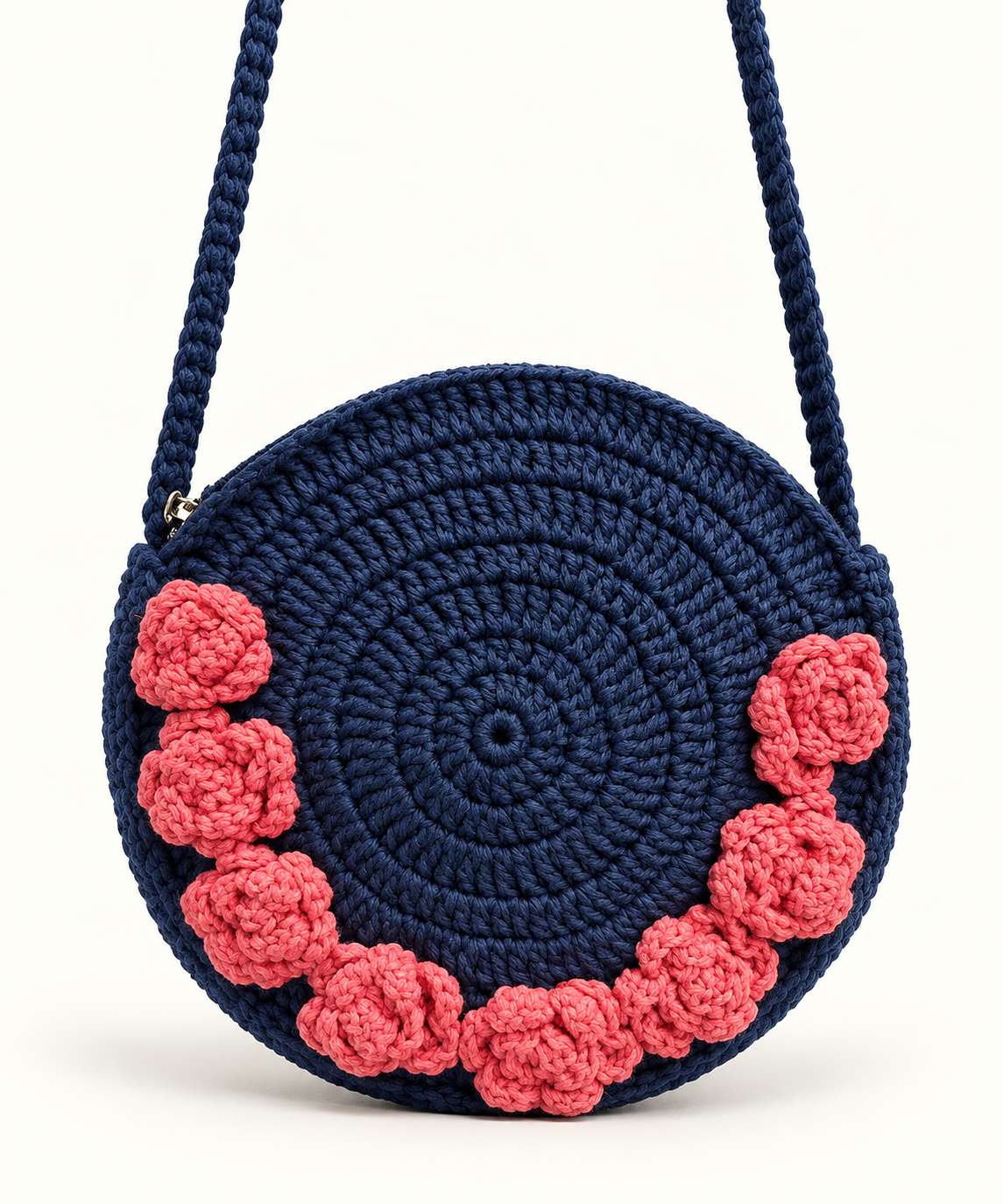 Navy blue round crochet shoulder bag with coral pink crochet roses