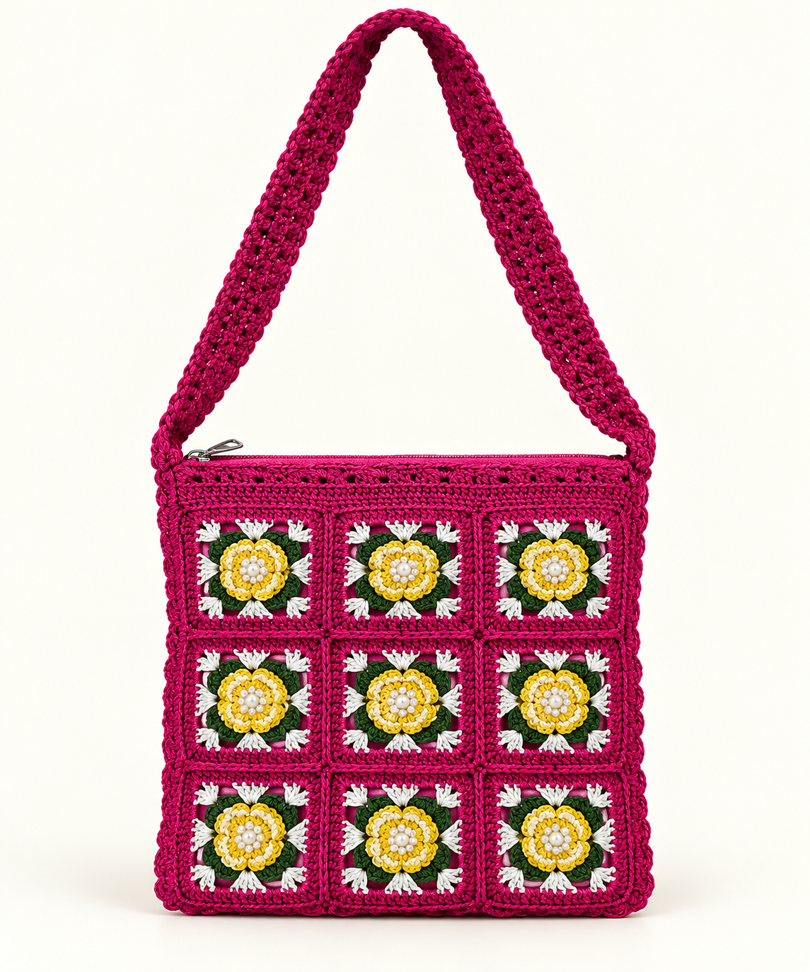 Vibrant magenta crochet shoulder bag with yellow and white floral granny squares