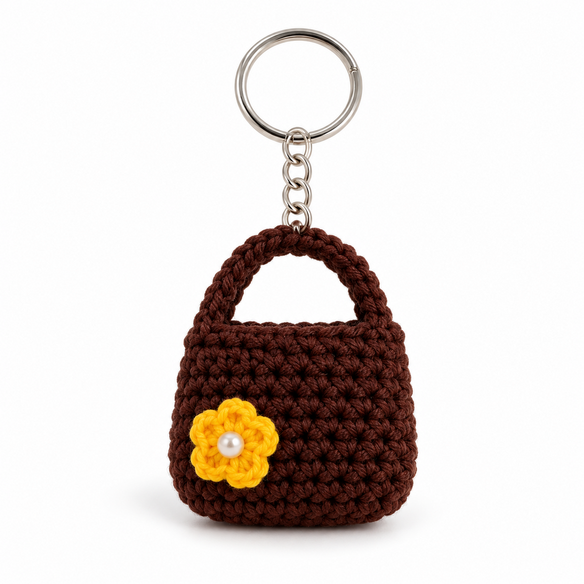 Brown crocheted handbag keychain with yellow flower