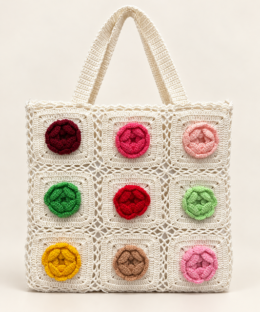 Ivory crochet tote bag with colorful crocheted floral motifs