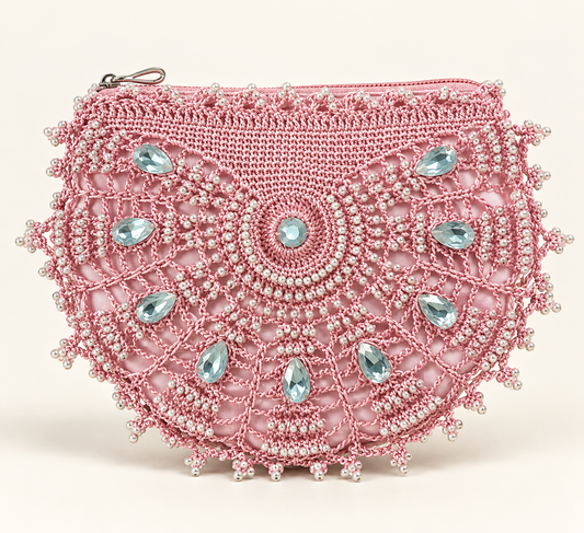 Ornate pink beaded crochet clutch with pearl embellishments and pale blue gemstones